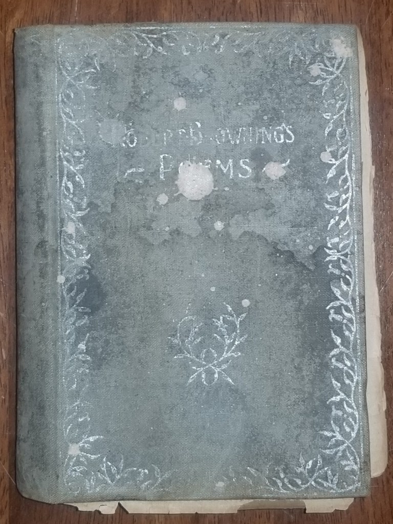 A worn book of Robert Browning's Poems.